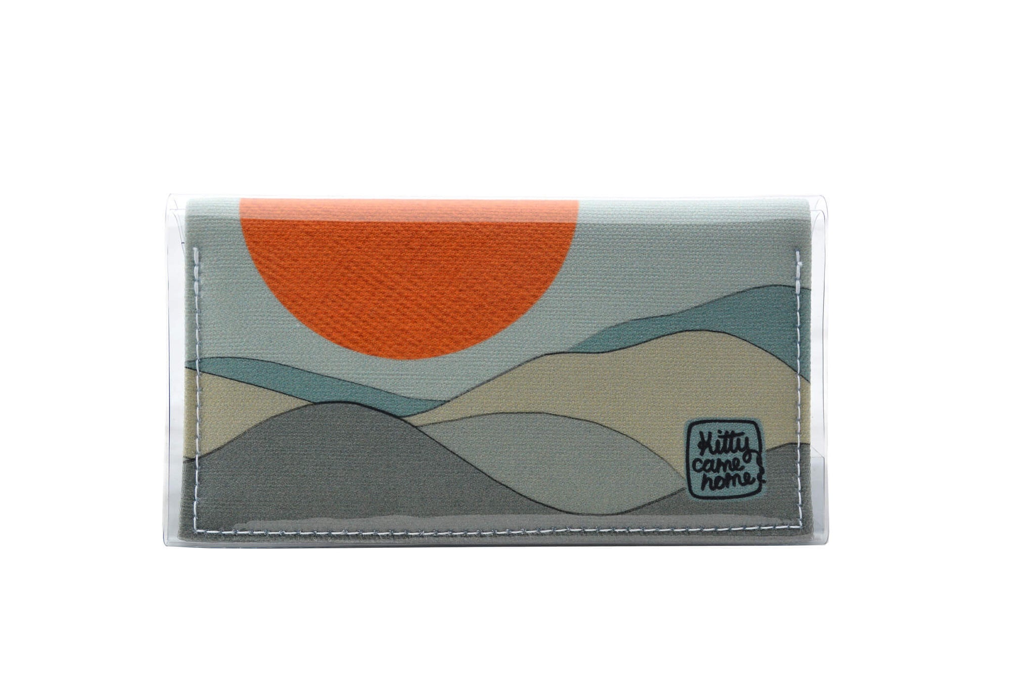 This is an image of the front of a Kitty Came Home bfild mini purse clutch in 'The night grows pale' design by Satin and Tat. An orange moon floats above a mist coloured landscape. This is the small size.