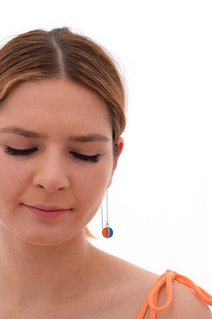 This is a photo of one of our Dear Daisy Colour Palette Pendulum thread earrings being modelled by our friend Amanda.
