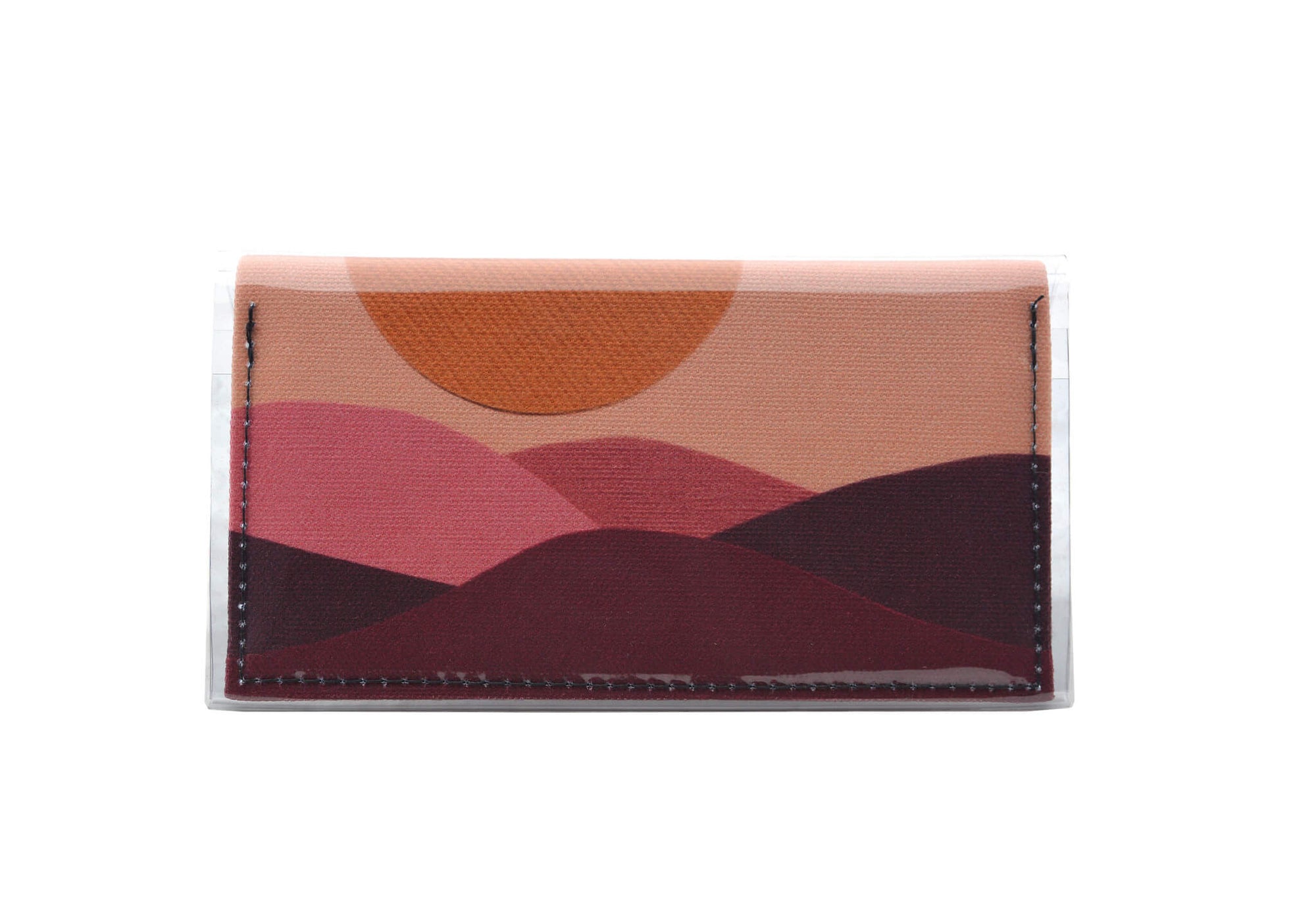 This is an image of the rear of a Kitty Came Home bifold mini purse clutch in the 'Moonage daydream' design by Satin and Tat. A golden sun above a burgundy landscape. This is the small size.