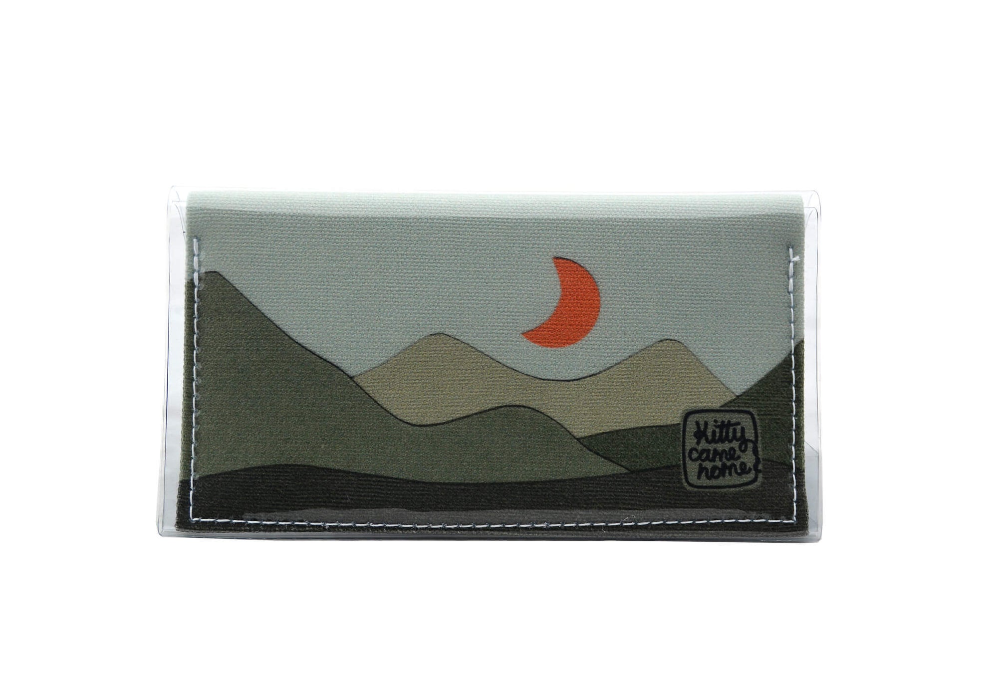 This is an image of the front of a Kitty Came Home bifold mini purse clutch in the 'Moondance' design by Satin and Tat. An orange crescent moon floats above a landscape of dark green hills. This is the small size.