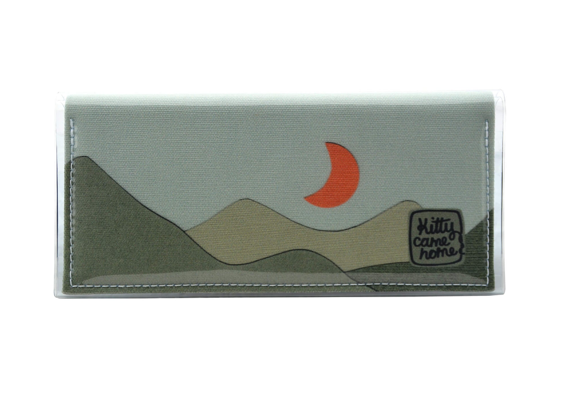 This image shows the front of a Kitty Came Home bifold purse clutch in the 'Moondance' design by Satin and Tat. An orange crescent moon floats above a landscape of dark green hills. This is the standard size.