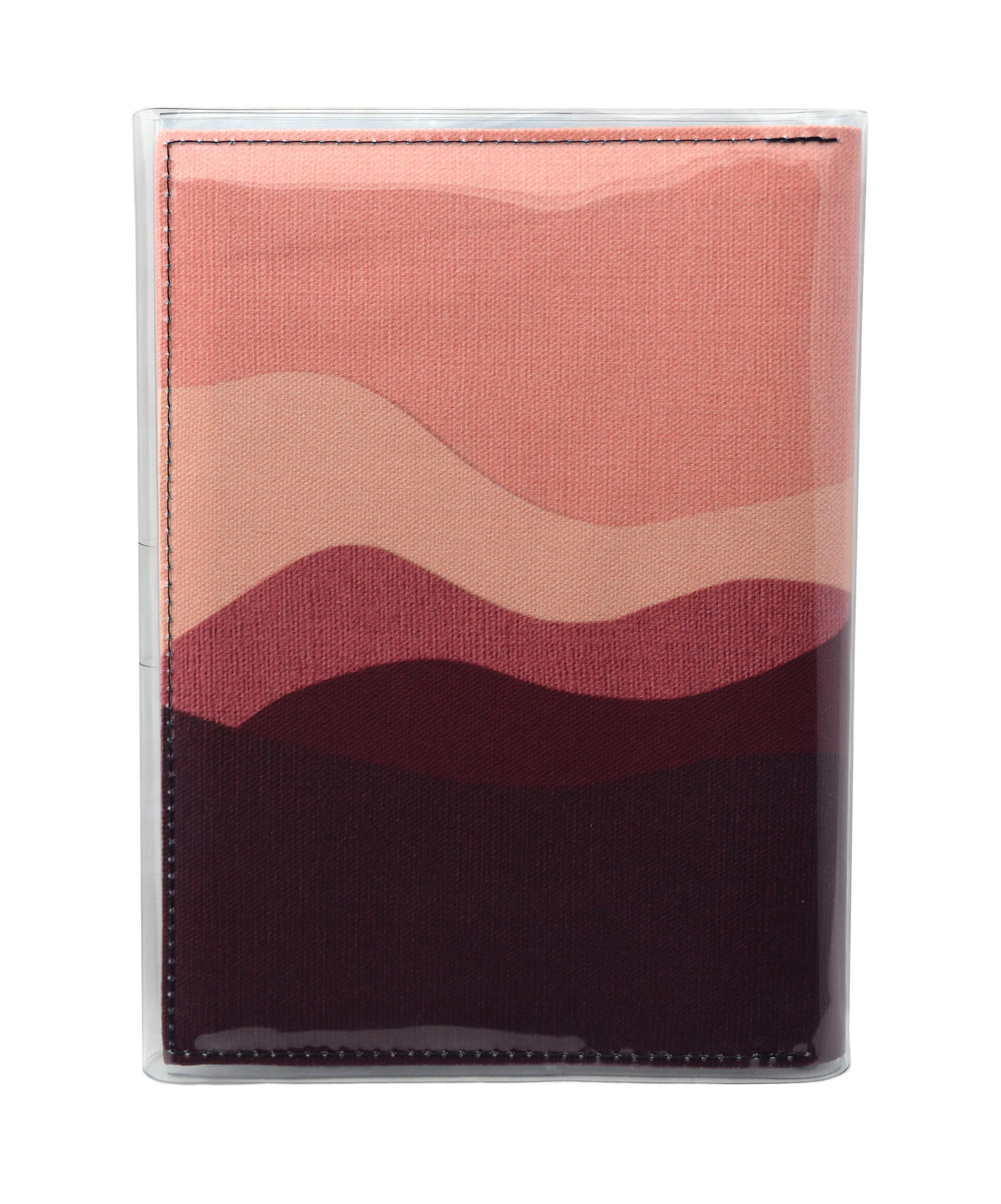 This is an image of the rear of a Kitty Came Home A5 journal in 'The night comes down' design by Satin and Tat. A pink and magenta landscape of rolling hills beneath a dusty pink sky.