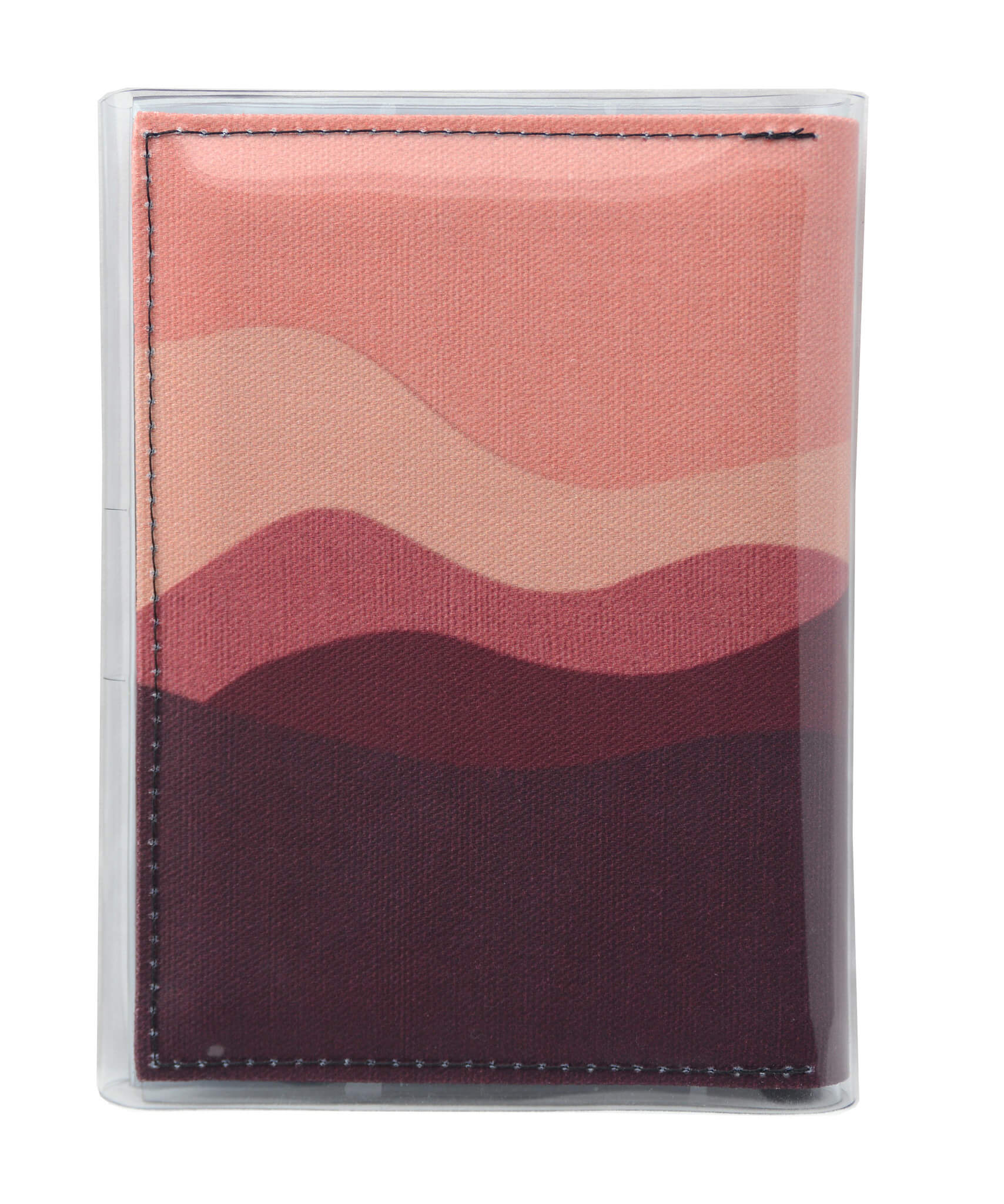 This is an image of the rear of a Kitty Came Home A6 journal in 'The night comes down' design by Satin and Tat. A pink and magenta landscape of rolling hills beneath a dusty pink sky.