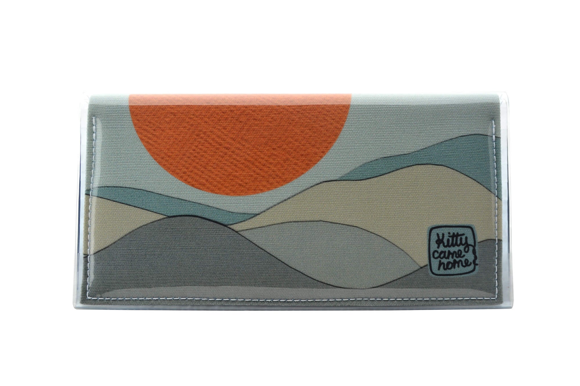 This is an image of the front of a Kitty Came Home bifold purse clutch in 'The night grows pale' design by Satin and Tat. An orange moon floats above a pale landscape. This is the large size.