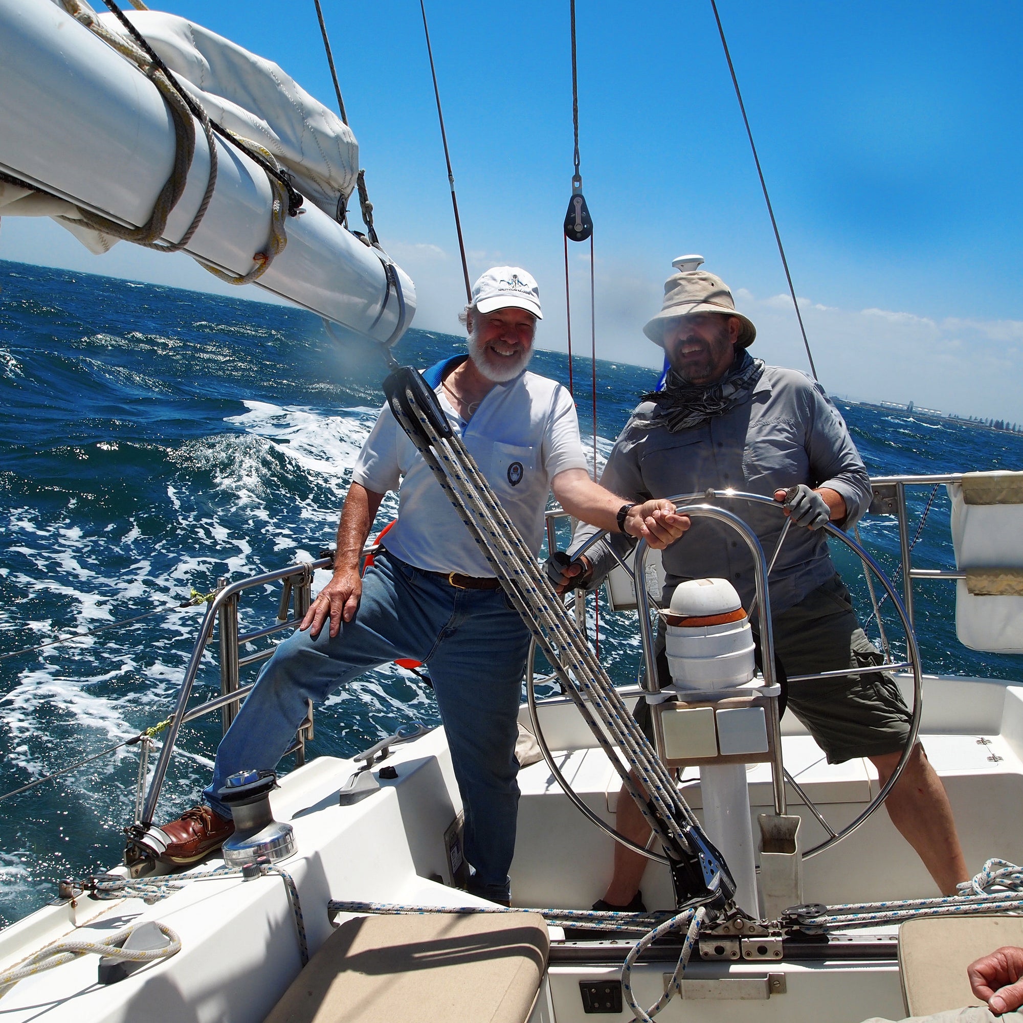 Designer-maker Farley and friend Arthur aboard the yacht Teal II